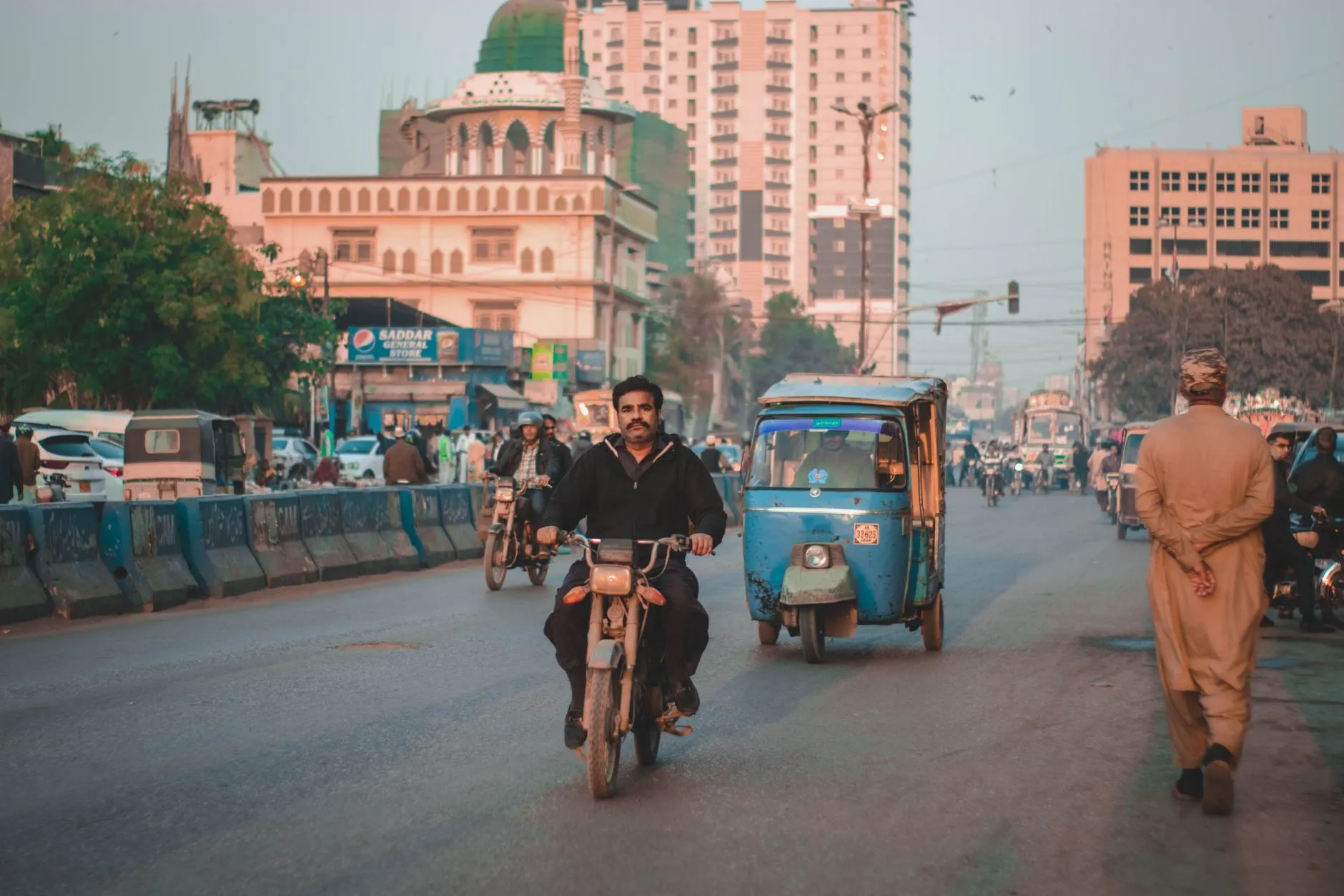 Busy Saddar street in Karachi with shop signs, the kind of local businesses customers search for nearby